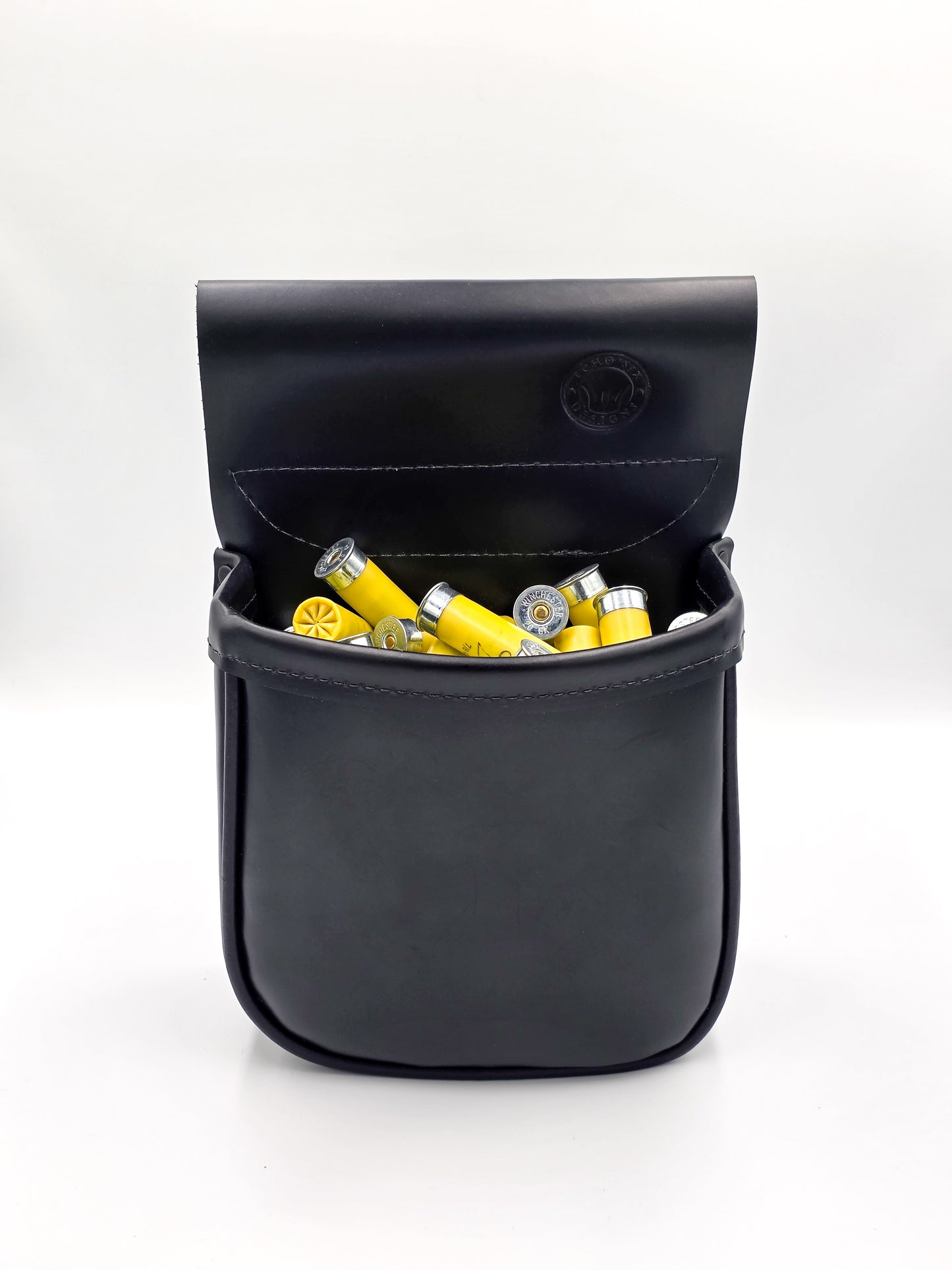 Black leather pouch with yellow and silver shotgun shells on a white background
