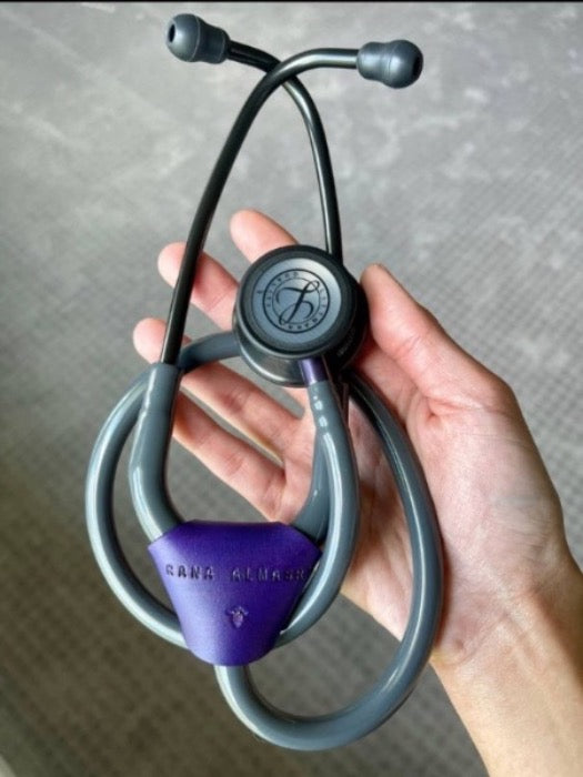 Purple leather stethoscope identification tag wrapped around a gray 3M Littmann Classic III Stethoscope